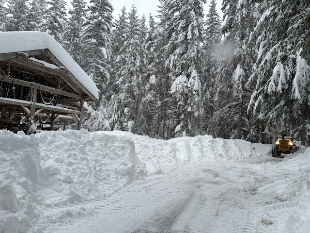 Bob plowing from the house to one of the sheds. Bob plowing from the house to one of the sheds.