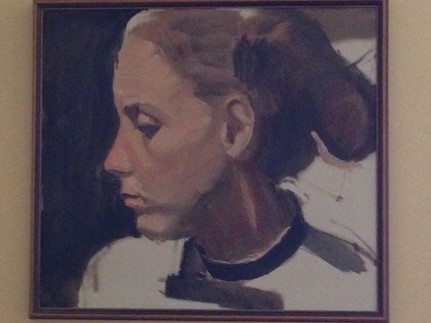  Waiting for laundry to finish—two parents, two children, two books. 